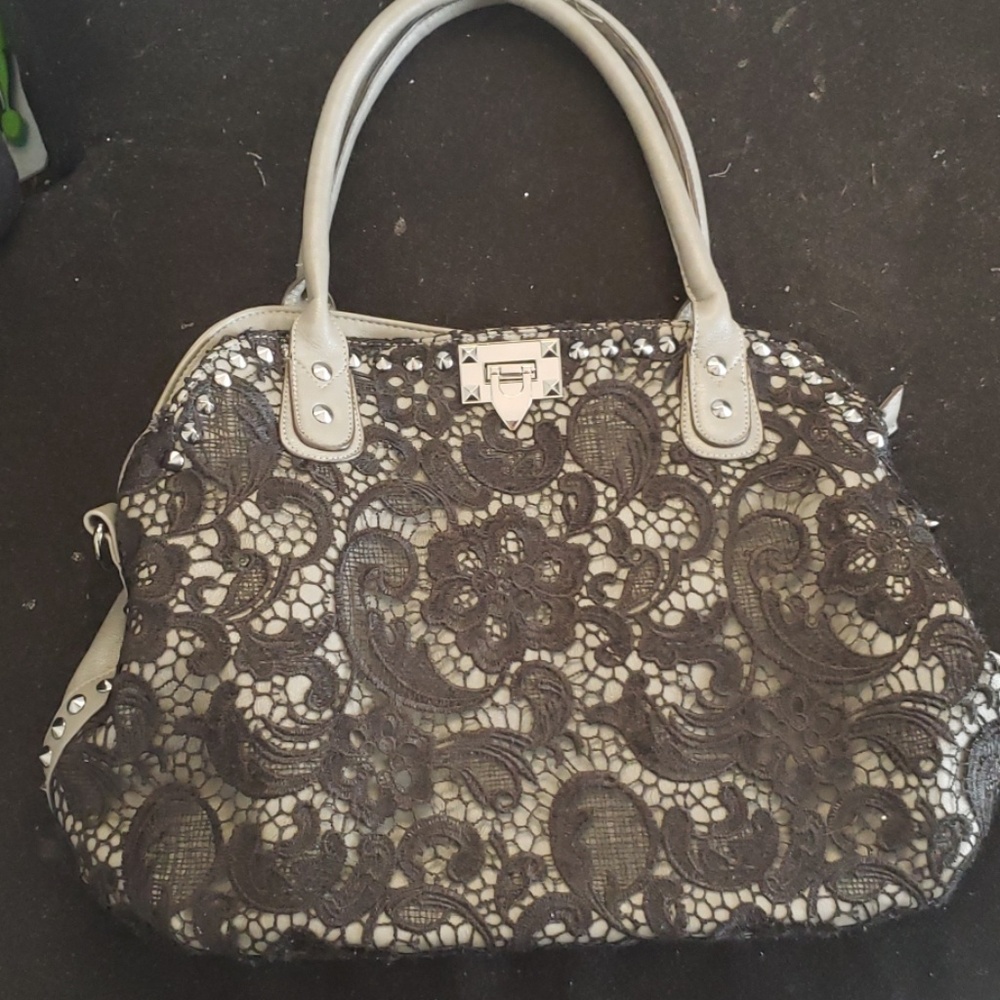 Grey purse with black lace over lace
